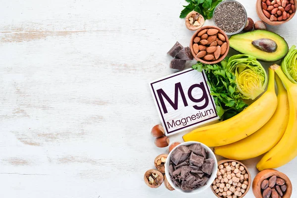 Foods Containing Natural Magnesium Chocolate Banana Cocoa Nuts Avocados Broccoli — Stock Photo, Image