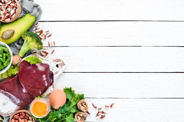 Potraviny Obsahující Přírodní Vitamín Játra Avokáda Brokolice Špenát Petržel Fazole — Stock fotografie
