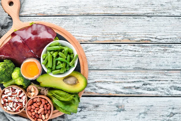 Livsmedel Som Innehåller Naturliga Vitamin Lever Avokado Broccoli Spenat Persilja — Stockfoto