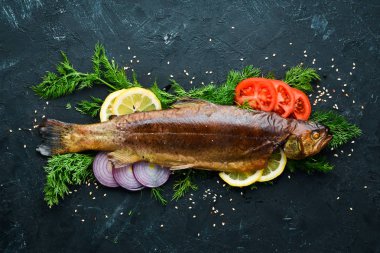 Sebzeli Fırında Alabalık. Üst te. Metniniz için boş alan. Rustik stil.