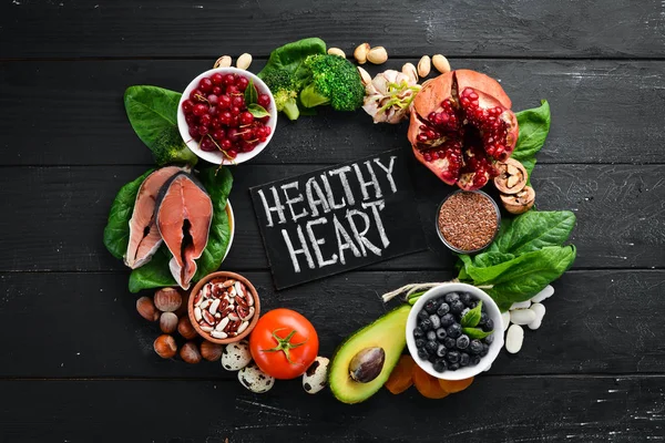 Food Heart Health Fish Blueberries Nuts Pomegranate Avocados Tomatoes Spinach — Stock Photo, Image