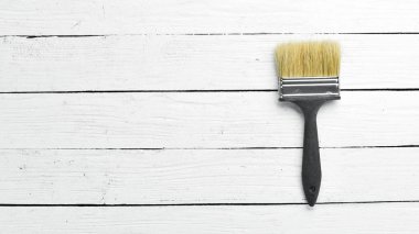 Boya çizmek için fırça. Üst te. Metniniz için boş alan.