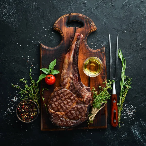 Grilled Cowboy Beef Steak Herbs Spices Black Stone Background Barbecue — Stock Photo, Image