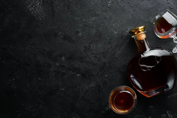 Bottle Cognac Glasses Black Background Brandy Top View Free Space — Stock Photo, Image