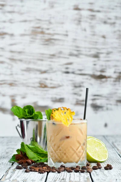 Alcoholic cream-coffee cocktail in a glass.