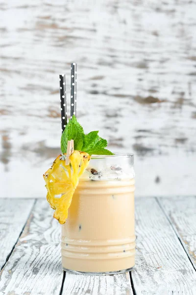 Alcoholic cream-coffee cocktail in a glass.