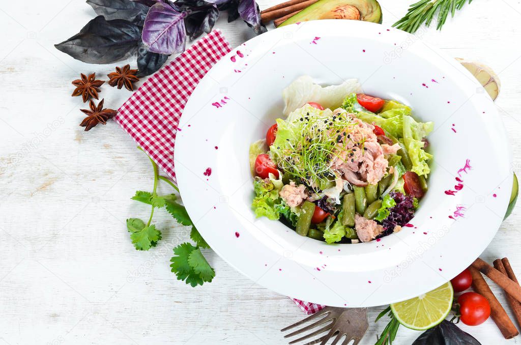 Vegetable Tuna Salad. In the plate. Top view. Free space for your text.