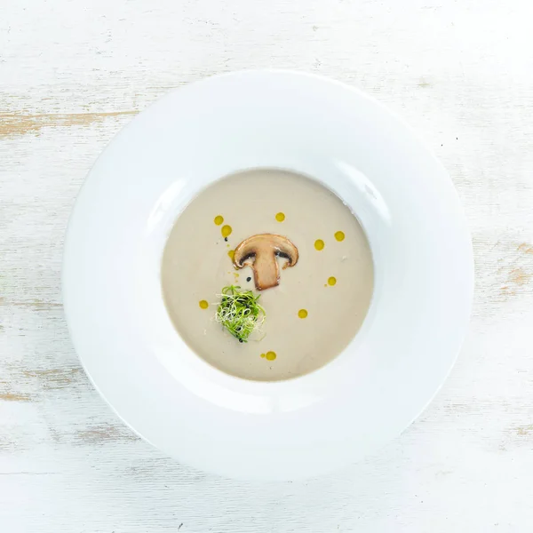 Cream soup of mushrooms. On a wooden background. Top view. Free space for your text. — Stock Image Cream Soup Mushrooms Wooden Background Top View Free Space Your Royalty Free Stock Images