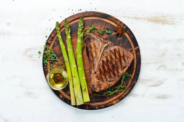 Medium Rare Grilled Bone Steak White Table Top View Free — Stock Photo, Image