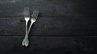 Eski çatal çatal bıçak takımı. Üst te. Metniniz için boş alan.