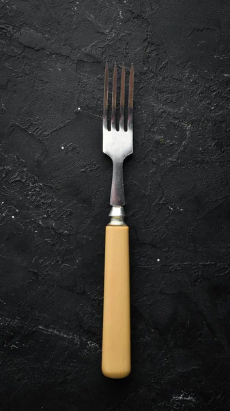 Old fork Cutlery. Top view. Free space for your text.