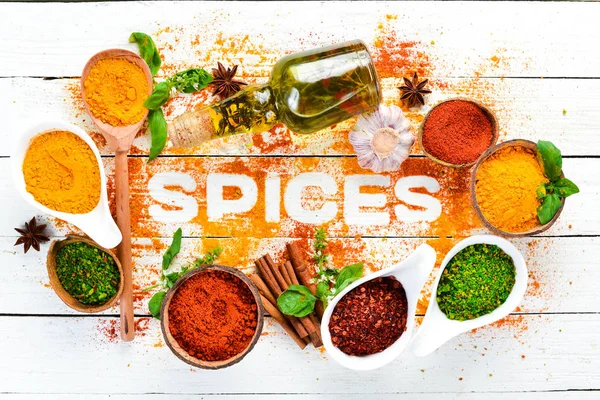 Various spices on white background. The word \