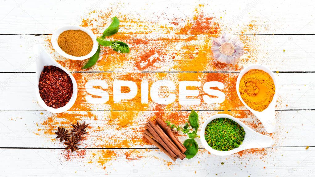 Various spices on white background. The word 