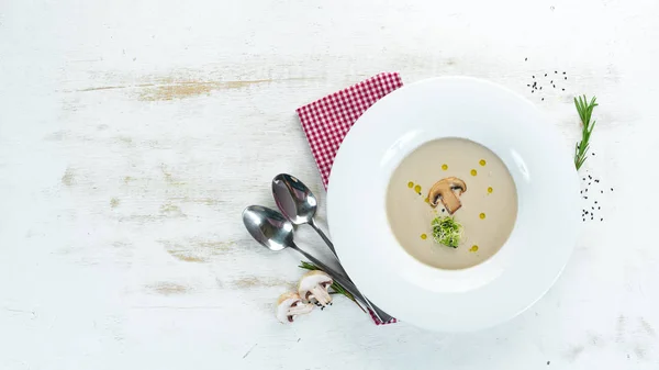 Cream soup of mushrooms. On a wooden background. Top view. Free space for your text. — Stock Image Cream Soup Mushrooms Wooden Background Top View Free Space Your Royalty Free Stock Images