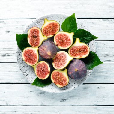 Arka plan olarak taze olgun incir, üst görünümü. Ücretsiz kopyalama alanı.