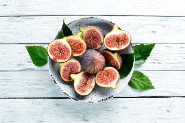 Arka plan olarak taze olgun incir, üst görünümü. Ücretsiz kopyalama alanı.