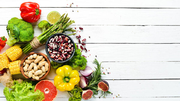 Organic food Fresh vegetables and fruits on a white background. Top view. Free copy space.