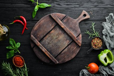 rustik bir arka plan, üst görünüm, afiş sağlıklı yemek için malzemeler. Metniniz için boş alan.