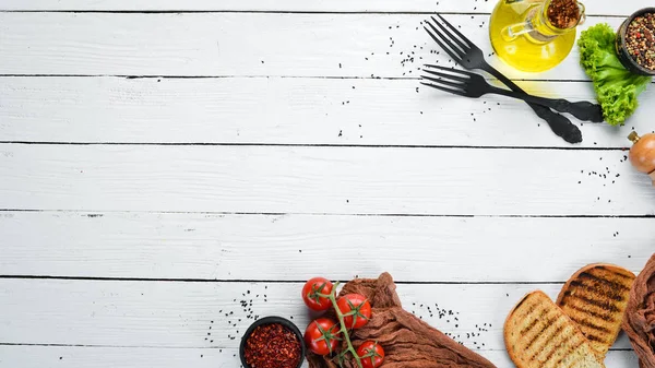 Cooking banner. White kitchen table and ingredients. Food. Top view. Free space for your text.
