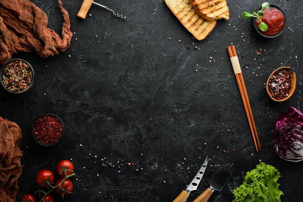 Cooking banner. Kitchen black table and ingredients. Food. Top view. Free space for your text.