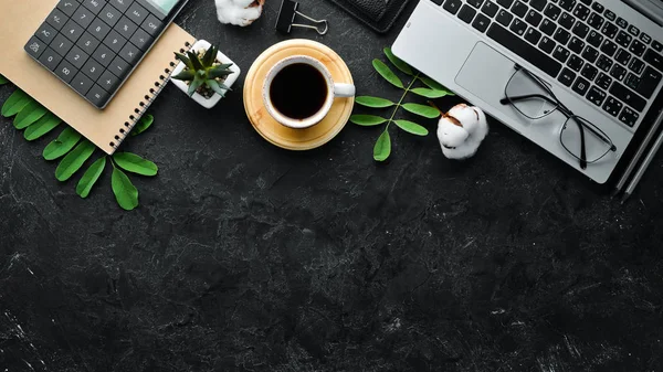 Office black desk with accessories. Top view. Free space for your text. Flat lay.