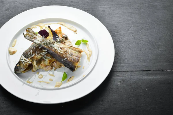 Baked trout on a plate. Dishes, food. Top view. Free space for your text. — Stock Image Baked Trout Plate Dishes Food Top View Free Space Your Royalty Free Stock Images