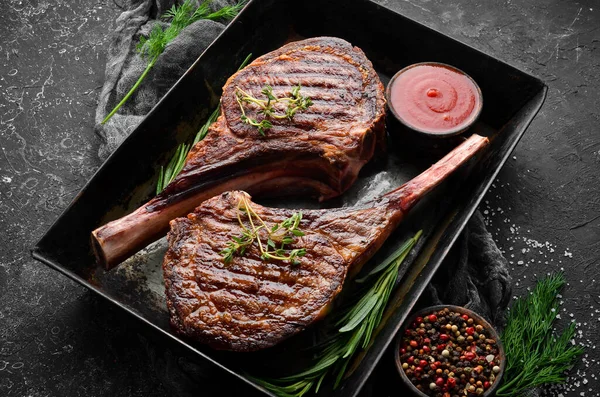 Juicy Steak Grilled Bone Spices Herbs Black Stone Background Top — Stock Photo, Image