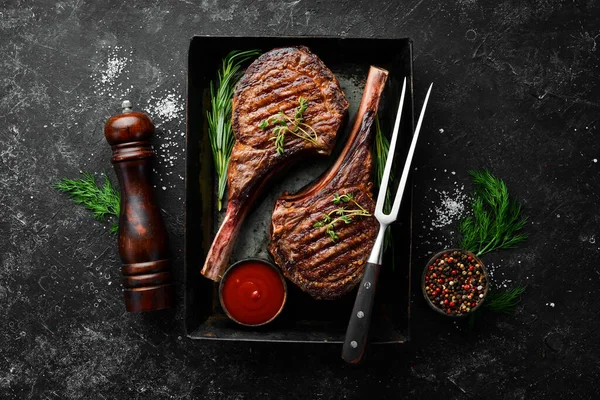 Juicy Steak Grilled Bone Spices Herbs Black Stone Background Top — Stock Photo, Image