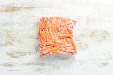 Donmuş havuç. Yiyecek malzemeleri. Üst Manzara. Metnin için boş yer.