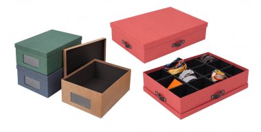 Box with folded things in the interior of the apartment clipart
