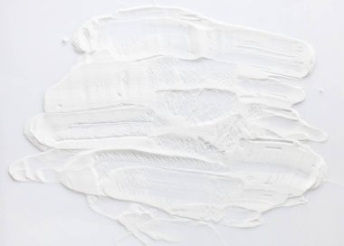 Arka plan kabartma tozu tozu beyaz arka plan üzerine dağınık.