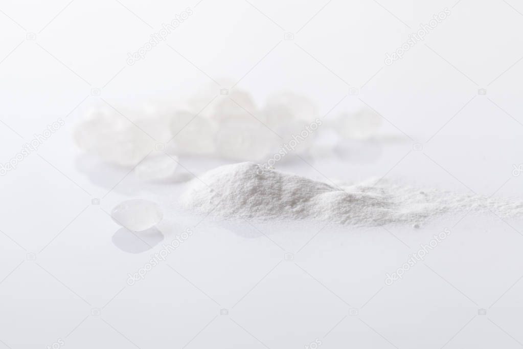 A pile of stabilizer powder on a white background.