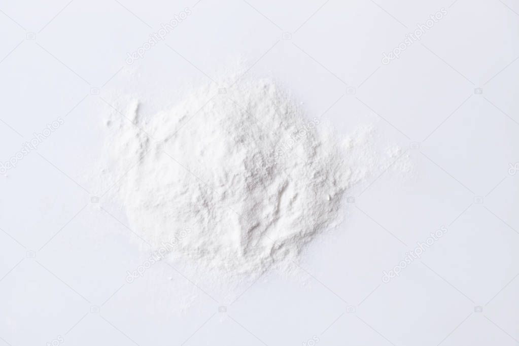Pile of chemical white powder aspartame E951  on white 