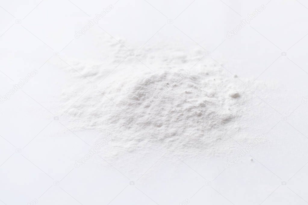 A pile of stabilizer powder on a white background.