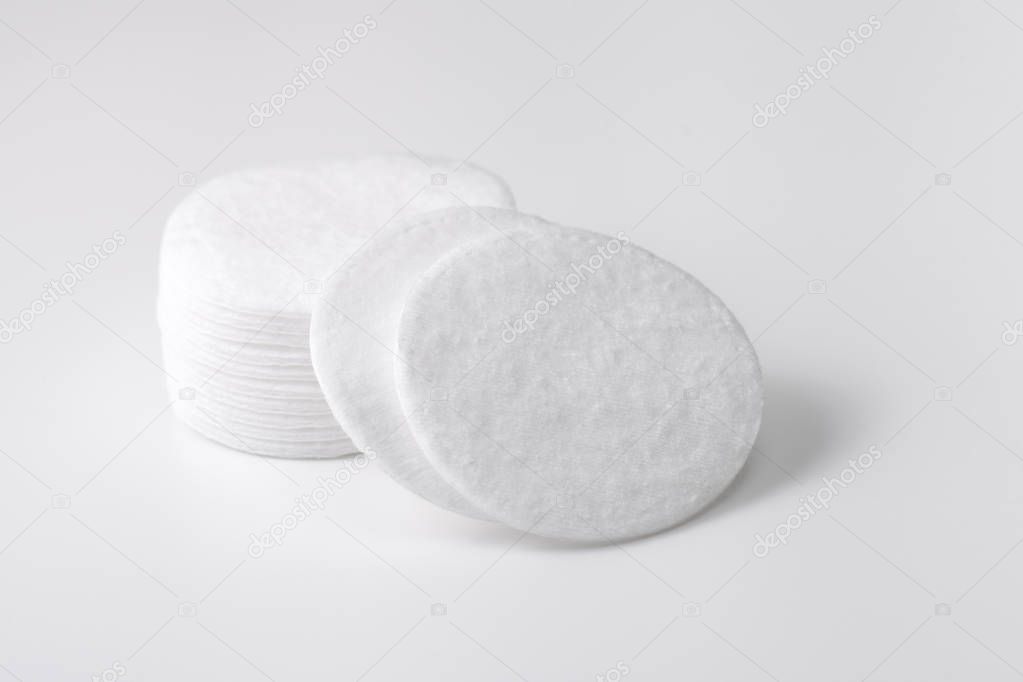 A stack of cotton pads and a number of separate discs deployed on the camera