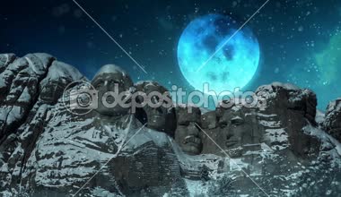 Noel Baba'ya bir kış kar 4k ile Rushmore Dağı döngü Rushmore Dağı bir görünüm içinde belgili tanımlık kış ile düşen kar ve dolunay arka planda Santa ile bir döngü içinde ay boyunca uçan özellikleri.