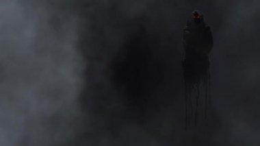 Sürücü sisli 4K döngüsünde süzülen karanlık figür siyah bir boşlukta süzülen parlak gözlü, koyu renkli bir figüre sahiptir.