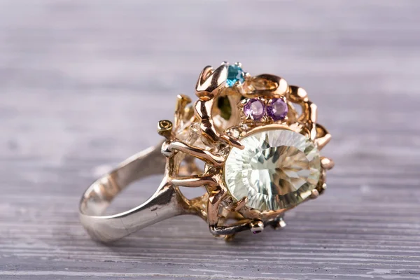 A silver ring with gemstones