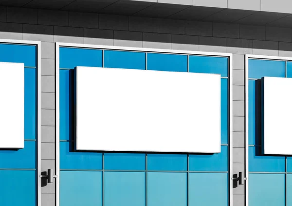 Blank horizontal billboard on glass facade. Background for mock-up.
