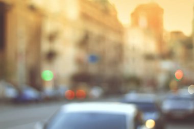 Güzel gün batımı şehir bokeh. Arka plan bulanık fotoğraf.