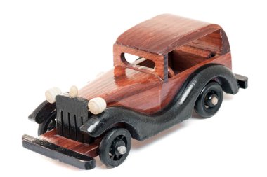 Arka plandan yalıtılmış bağbozumu ahşap oyuncak araba