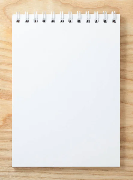 Vista Superior Caderno Branco Espiral Fundo Mesa Madeira — Fotografia de Stock