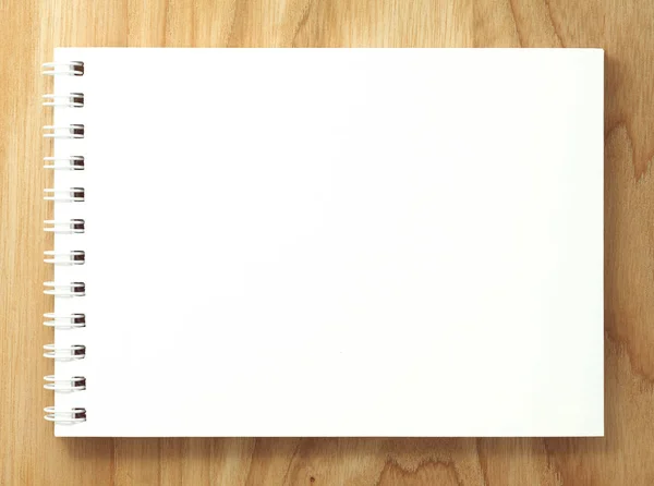 Vista Superior Caderno Branco Espiral Fundo Mesa Madeira — Fotografia de Stock