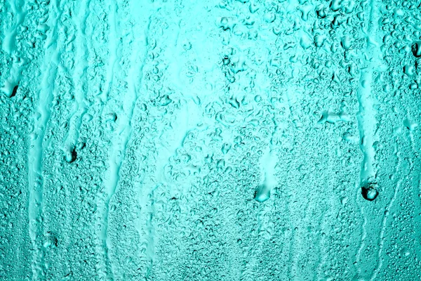 Дождливое Окно Капли Стекло Синем Свете Сзади — стоковое фото