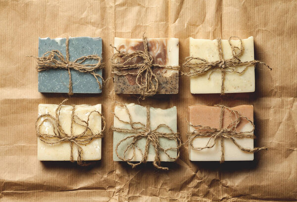 Organic handmade soap on packing paper.