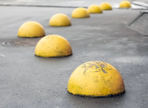 Concrete anti-parking bollards — Stock Photo, Image