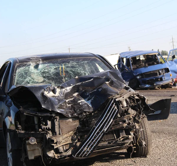 Two Cars Damaged In A Road Collision