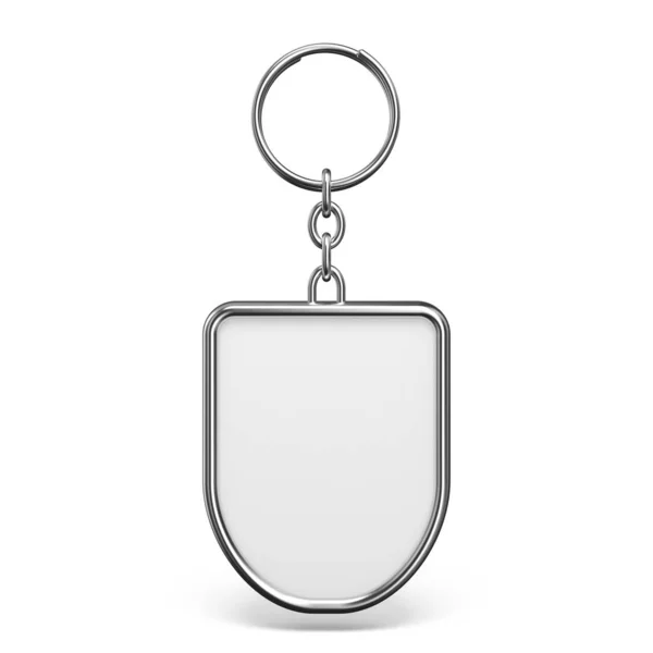 Baratija de metal en blanco con un anillo para una forma de escudo clave 3D —  Fotos de Stock