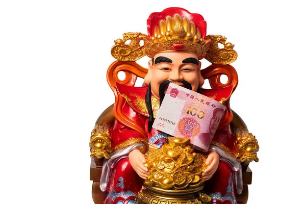 100 Yuan 'lık banknot ve geleneksel Taocu Zengin Tua Peng Kong heykelciği.