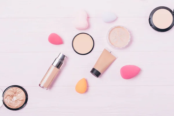 Cosmetics for smooth skin tone and sponges
